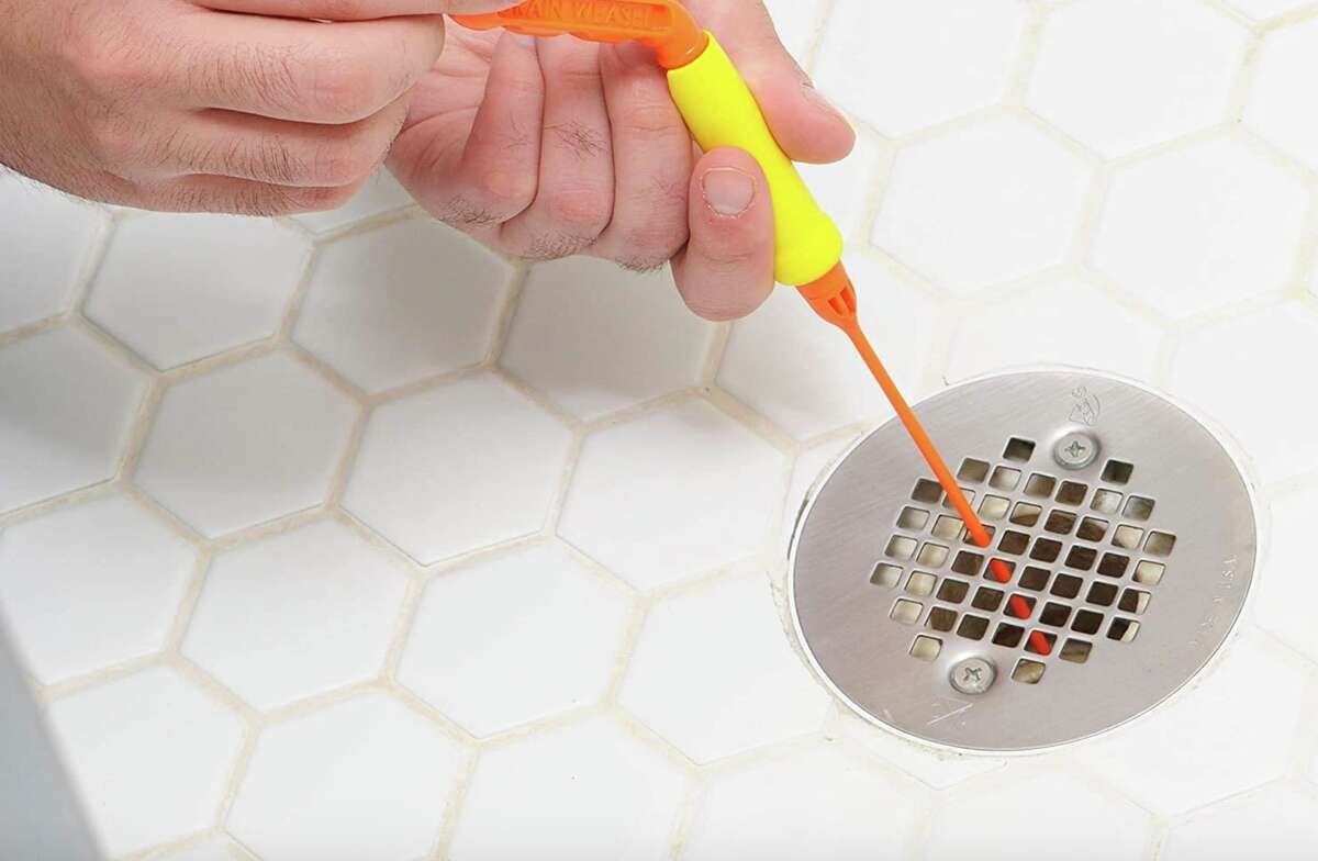clogged shower drain cleaning plumbers
